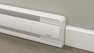 Electric baseboard heater installed in a house basement.